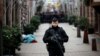 A French gendarme secures a street at the scene of a police operation the day after a shooting in Strasbourg, Dec. 12, 2018. 