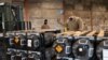 Airmen and civilians load ammunition, weapons and other equipment bound for Ukraine at Dover Air Force Base, Delaware, Jan. 21, 2022.