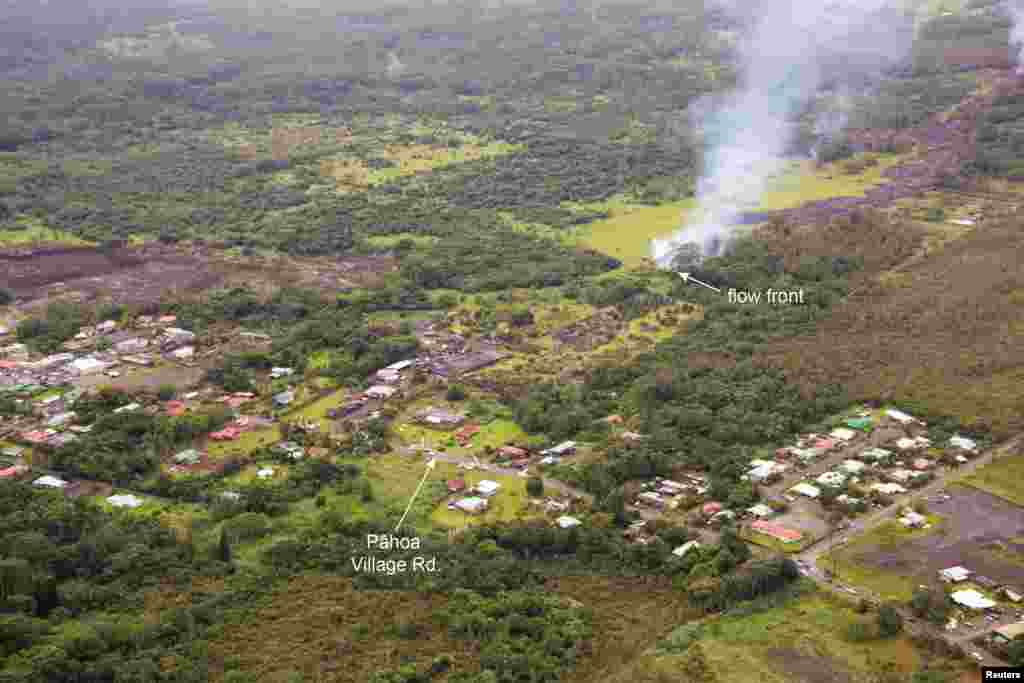 The lava flow from the Kilauea Volcano is seen nearing residential areas in a U.S. Geological Survey image taken near the village of Pahoa, Hawaii, Oct. 27, 2014. 