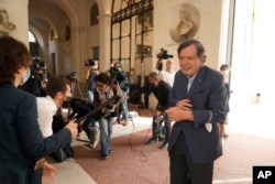 Italian theoretical physicist Giorgio Parisi speaks to journalists as he arrives at the Accademia dei Lincei , Tuesday, Oct. 5, 2021. (AP Photo/Domenico Stinellis)