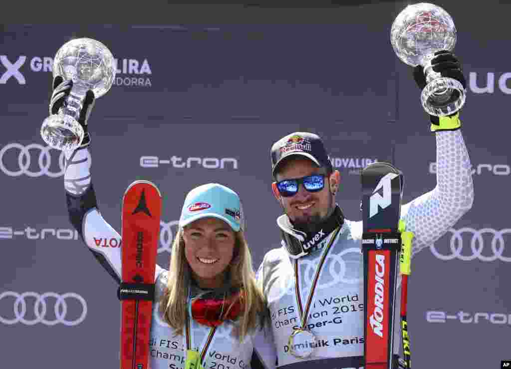 میکائیل شیفرین (چپ) از آمریکا و دومنیک پاریس از ایتالیا قهرمانی شان را در مسابقات جهانی اسکی آلپاین جشن می گیرند.&nbsp;