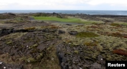 Volcanic rocks are seen at the Golfklubberinn Oddur golf course, near Rekyavik, June 5, 2013. The lava beds dominate the rough on many courses, and the beds are filled with crevices that swallow mis-hit golf balls.