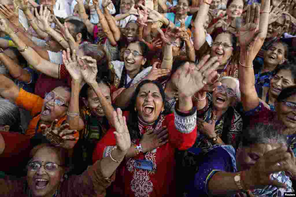 Hundreds of people, who believe that laughter is the best medicine for a happy and healthy life, take part in an attempt to break a world record of the largest gathering of senior citizens at a laughing exercise in Mumbai, India, May 5, 2014.