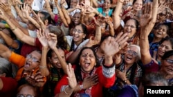 Members of a laughter club participate in a laughing exercise in Mumbai, India, May 2014. Don't tell them that India ranks quite low on the United Nations' happiness survey. 