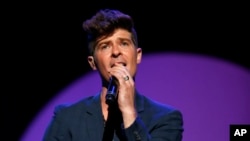Pop singer Robin Thicke's "Blurred Lines," featuring T.I. and Pharrell Williams was a top seller on iTunes for the week ending June 17.