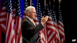 In this Feb. 19, 2010 file photo, Rep. Mike Pence, R-Ind., gestures while addressing the Conservative Political Action Conference (CPAC) in Washington. 