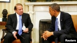 U.S. President Barack Obama speaks with Pakistan's Prime Minister Nawaz Sharif during their meeting at the White House.
