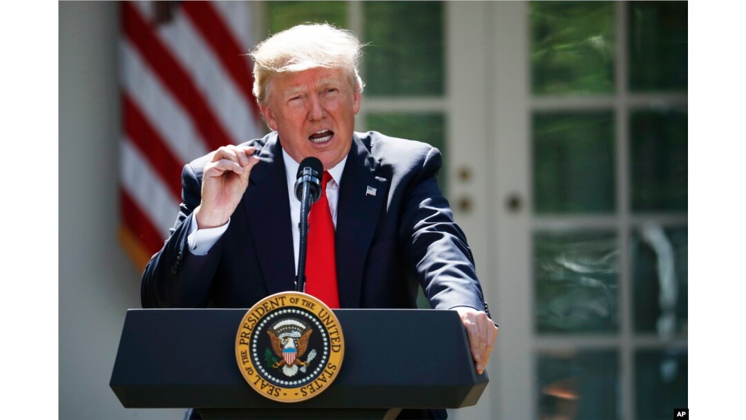 President Donald Trump speaks about the U.S. role in the Paris climate change accord, June 1, 2017, in the Rose Garden of the White House in Washington.