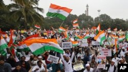 Aksi unjuk rasa di Bangalore, India, 23 Desember 2019. (AP Photo/Aijaz Rahi)