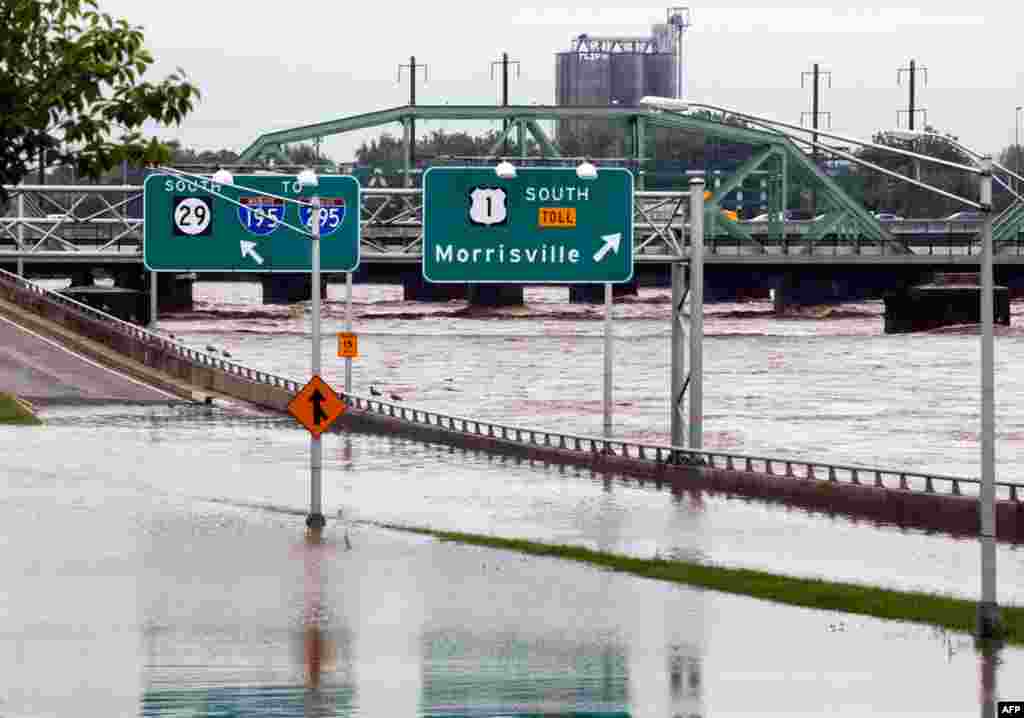 September 8: The area's major north-south highway, is flooded in Trenton, N.J., as the Delaware River continues to rise. (AP Photo/Mel Evans)