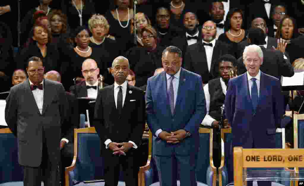 Louis Farrakhan, from left, Rev. Al Sharpton, Rev. Jesse Jackson and former President Bill Clinton attend the funeral service for Aretha Franklin at Greater Grace Temple in Detroit.