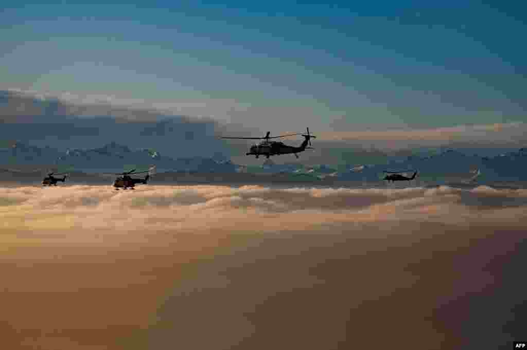 A helicopter carrying U.S. President Donald Trump flies over the Swiss Alps on his way to the the World Economic Forum in Davos, Switzerland.