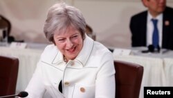 Britain's Prime Minister Theresa May is pictured during a portion of the G-7 summit in the Charlevoix city of La Malbaie, Quebec, Canada, June 9, 2018.