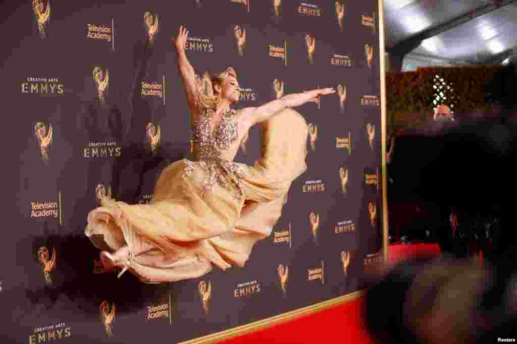 Jessie Graff from &quot;American Ninja Warrior&quot; poses for photographers at the 2017 Creative Arts Emmy Awards in Los Angeles, California, Sept. 9, 2017.