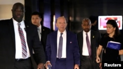 U.S. Commerce Secretary Wilbur Ross (C), a member of the U.S. trade delegation to China, leaves a hotel in Beijing, China, May 3, 2018. 