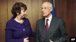 European High Representative for Foreign Affairs and Security Policy Ashton meets Tunisia's Foreign Minister Ounaies at the European Commission headquarters in Brussels, February 2, 2011