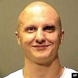 Jared Lee Loughner, the suspect in the attempted assassination of U.S. Representative Gabrielle Giffords, is shown in this Pima County Sheriff's Forensic Unit handout photograph released, 10 Jan 2011