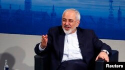 FILE - Iranian Foreign Minister Foreign Minister, pictured at the 2015 Munich Security Conference, says his country and Saudi Arabia "must overcome years of strained relations and work for stability in Syria and the Middle East.” 