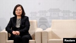FILE - Taiwan's President Tsai Ing-wen attends American Chamber of Commerce (AmCham)’s yearly dinner event, in Taipei, Taiwan, March 21, 2018. 