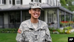 FILE - Cadet Simone Askew, of Fairfax, Virginia, answers questions during a news conference, in West Point, New York, Aug. 14, 2017. Askew, an African American, is among 32 Americans awarded Rhodes scholarships to study at Oxford University in England.