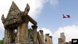 A Cambodian flag flutters near an entrance gate to Cambodia's Preah Vihear temple on the Cambodian-Thai- border in Preah Vihear province.