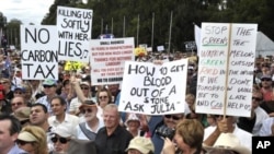 Protesters show their anger during a demonstration against the Australian Labor Governments proposed carbon tax outside Parliament House, Canberra, Australia (File Photo - March 23, 2011)