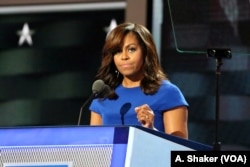 First Lady Michelle Obama spoke of the importance of those in the White House serving as role models to the nation's children at the Democratic National Convention in Philadelphia July 25, 2016 (A. Shaker/VOA)