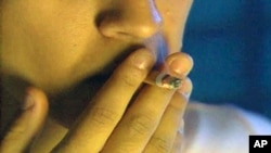 Americans who smoke are beginning to feel unwanted as federal laws prevent them from smoking in public buildings