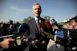 FILE - French Finance Minister Bruno Le Maire speaks at the National Palace of Culture in Sofia, Bulgaria, April 27, 2018.