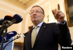 Russian Ambassador Alexander Yakovenko addresses the media at a news conference in the official Russian Ambassador's residence in central London, Britain, April 13, 2018.