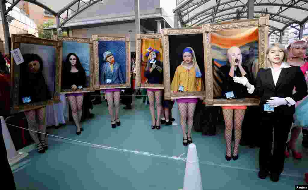 Participants in costumes pose before a Halloween parade in Kawasaki, south of Tokyo, Japan.