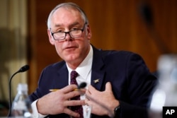 Interior Secretary Ryan Zinke testifies before the Senate Committee on Energy and Natural Resources during a committee hearing on the President's Budget Request for Fiscal Year 2019, March 13, 2018, on Capitol Hill in Washington.