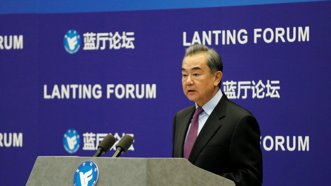 中國國務委員兼外交部長王毅2021年2月22日在一個論壇上談中美關係(路透社)