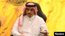 Qatar's Foreign Minister Sheikh Mohammed bin Abdulrahman al-Thani gestures during an interview in Doha, Nov. 26, 2016. 