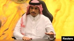 FILE - Qatar's Foreign Minister Sheikh Mohammed bin Abdulrahman al-Thani gestures during an interview in Doha, Nov. 26, 2016. 