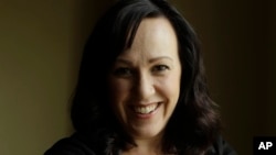 MJ Hegar, shot down in Afghanistan nine years ago, is running for a Texas congressional seat, on Aug. 9, 2018. 