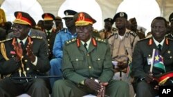 Unidentified high ranking commanders of the Sudan People's Liberation Army attend the inauguration ceremony of President Salva Kiir in Juba, southern Sudan on Friday, May 21, 2010.