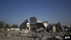 FILE - View of the destroyed compound of former Libyan leader Moammer Gadhafi in Tripoli's Bab al-Aziziya, June 2, 2012.