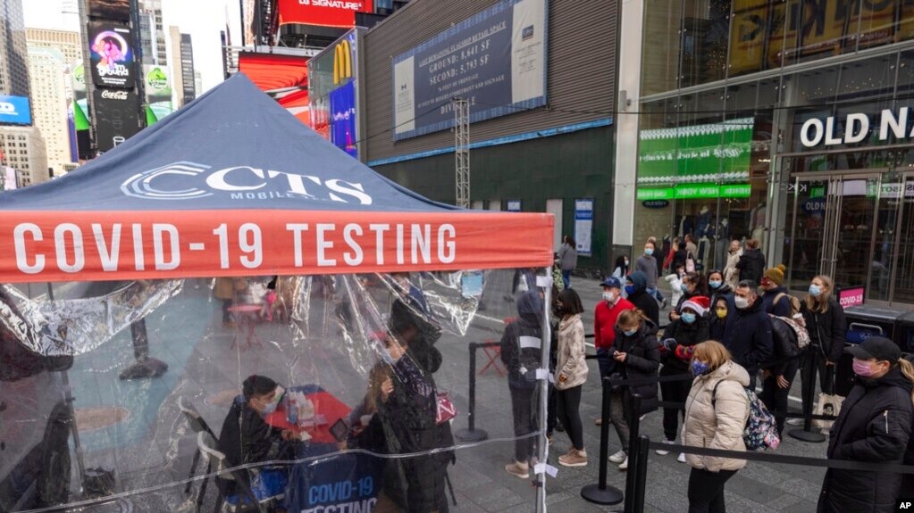 People wait to get tested for COVID-19 at a mobile testing site in Times Square on Dec. 17, 2021, in New York. (AP)