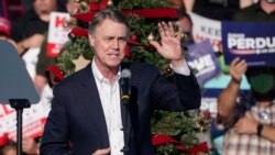 FILE - Sen. David Perdue, a Republican, speaks during a rally in Augusta, Georgia, Dec. 10, 2020. 