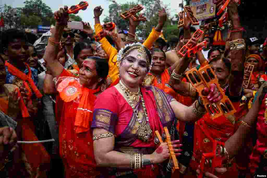 Hindu devotees dance as they take part in the annual Rath Yatra, or chariot procession, in Ahmedabad, India.