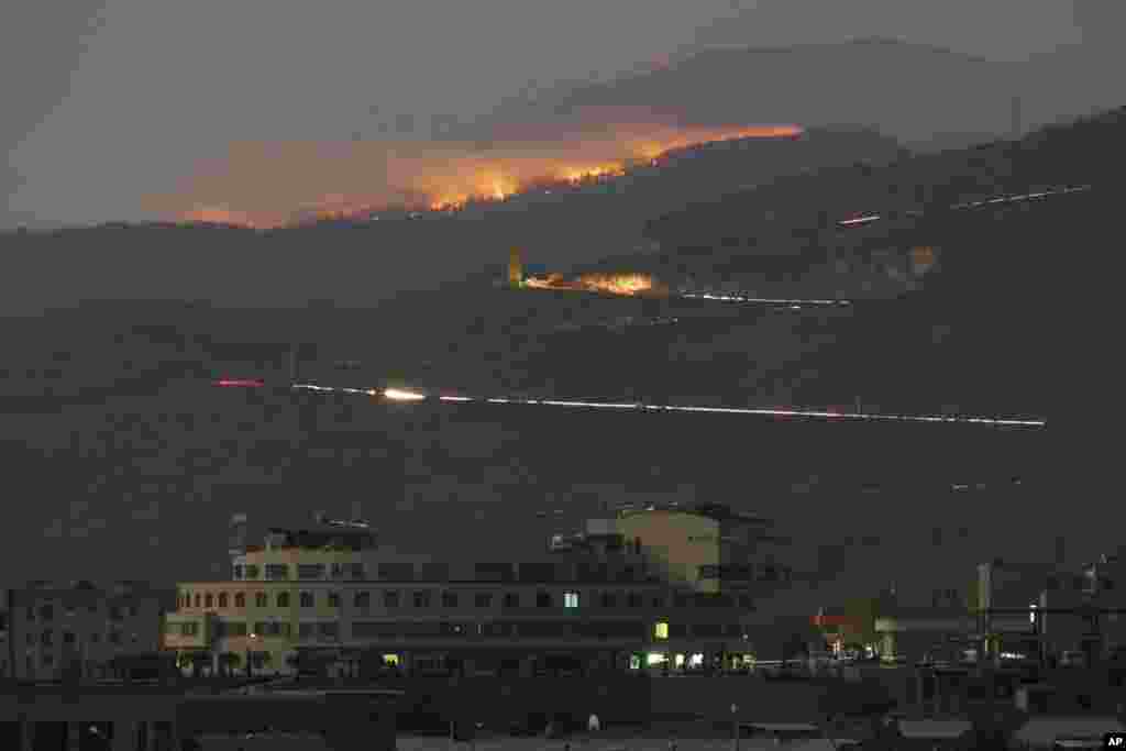 Forest in the mountains burns after shelling by Azerbaijan&#39;s artillery during a military conflict outside Stepanakert, the separatist region of Nagorno-Karabakh, Oct. 31, 2020.