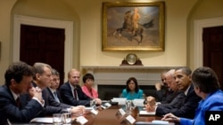 President Barack Obama and Vice President Joe Biden meet with BP executives in the Roosevelt Room of the White House, 16 Jun 2010, to discuss the BP oil spill in the Gulf of Mexico