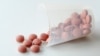 FILE - Ibuprofen pills.
