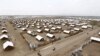 FILE - An aerial view shows houses at the Kakuma refugee camp in Turkana District, northwest of Kenya's capital Nairobi, June 20, 2015. A malaria outbreak in the nearby Kalobeyei refugee complex has killed at least 4 people.