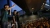 Joshua Wong, 17-year-old student leader, address protesters during a rally in the occupied areas at Central district in Hong Kong, Oct. 9, 2014. 