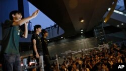 Lãnh tụ sinh viên Joshua Wong, 17 tuổi, phát biểu trong một cuộc biểu tình tại một khu vực bị chiếm đóng ở trung tâm Hong Kong, ngày 9/10/2014.