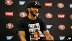 San Francisco 49ers quarterback Colin Kaepernick answers questions at a news conference after an NFL preseason football game against the Green Bay Packers Friday, Aug. 26, 2016.