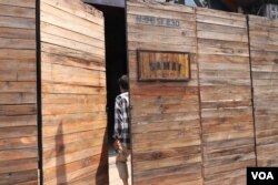 A man enters Samai Distillery in Phnom Penh, Cambodia, March 31, 2020. (Phorn Bopha /VOA Khmer)