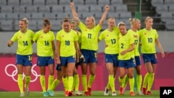 In this July 21, 2021, file photo, Sweden's Stina Blackstenius (11) celebrates scoring her side's second goal against the United States during a women's soccer match at the 2020 Summer Olympics, in Tokyo. (AP Photo/Ricardo Mazalan, File)